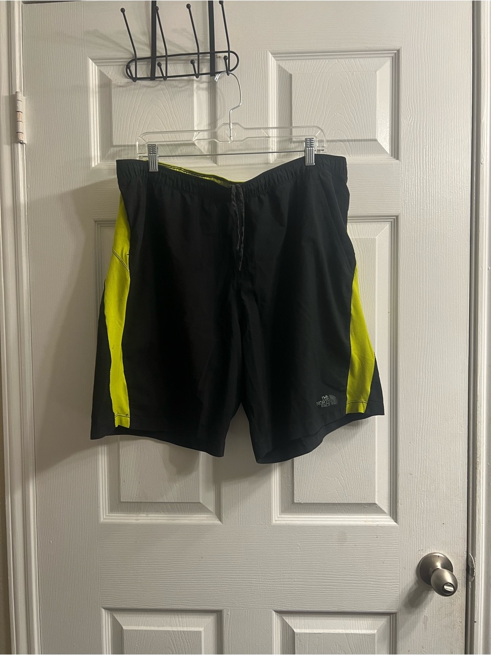 The North Face Men's Black Swim Shorts with Neon Yellow Side Panels